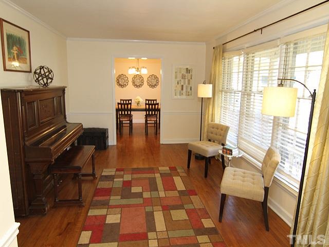 3819 Pickett Road Durham, NC 27705 - Photo 3 of 25 Formal living room leading to separate dining room.