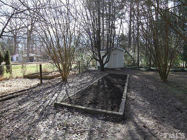 3819 Pickett Road Durham, NC 27705 - Photo 23 of 25 Multiple raised garden beds let you grow your own food, herbs or flowers.