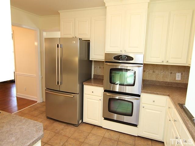 3819 Pickett Road Durham, NC 27705 - Photo 5 of 25 Beautifully updated kitchen includes stainless appliances and double oven.