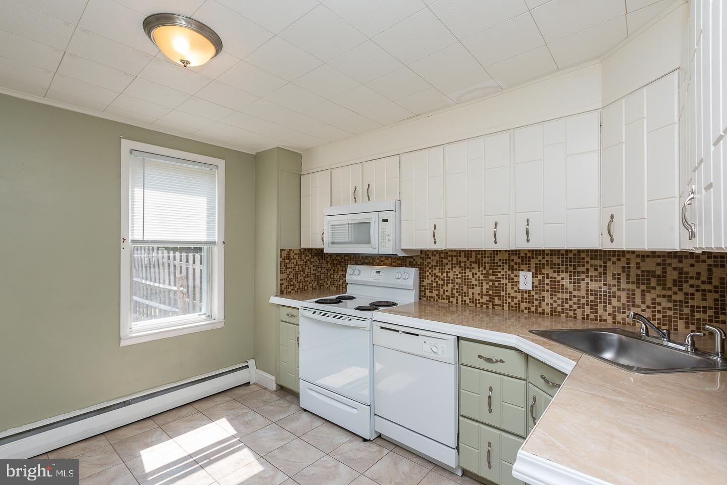 334 East Conestoga Road Wayne, PA 19087 - Photo 15 of 38 Spacious, sunny kitchen