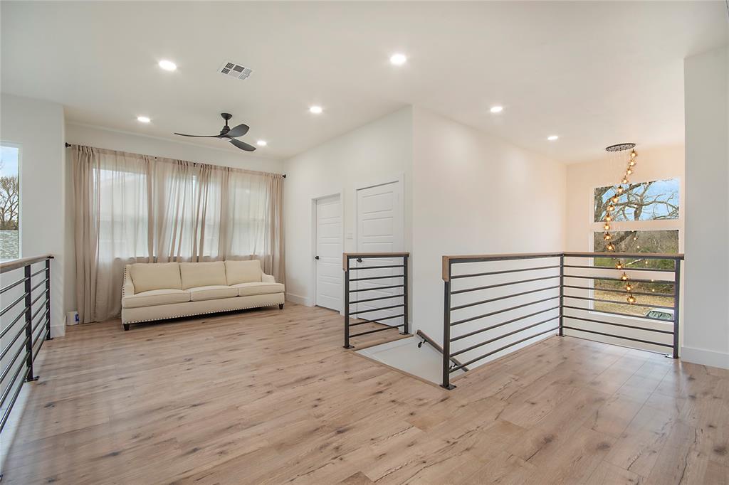 4648 Corregidor Street Dallas, TX 75216 - Photo 17 of 30 a view of a hallway with stairs