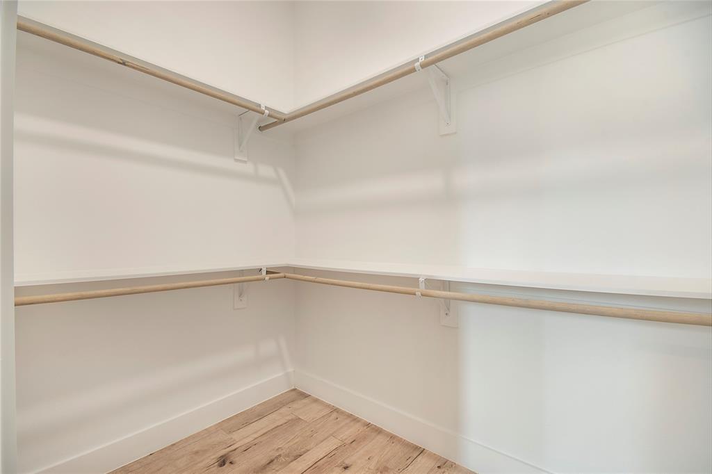 4648 Corregidor Street Dallas, TX 75216 - Photo 23 of 30 a view of an empty walk in closet