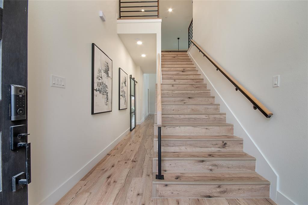 4648 Corregidor Street Dallas, TX 75216 - Photo 3 of 30 a view of entryway and hall with wooden floor
