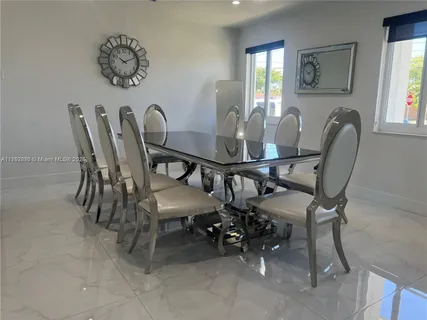 a view of a dining room with furniture