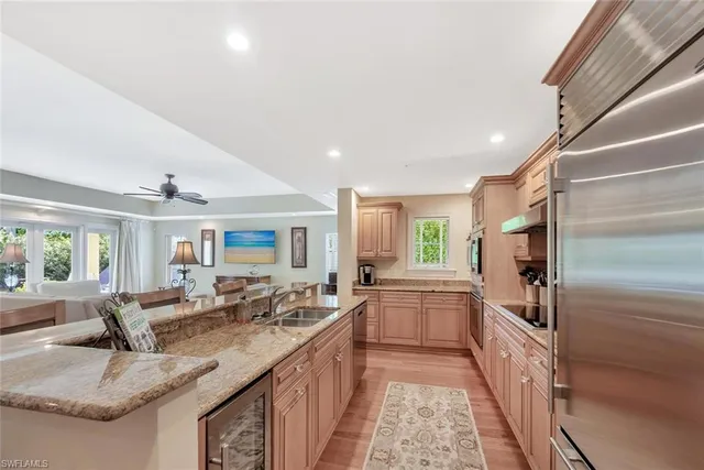a kitchen with granite countertop a sink and counter space