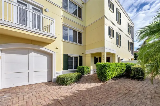 a front view of a multi story residential apartment building