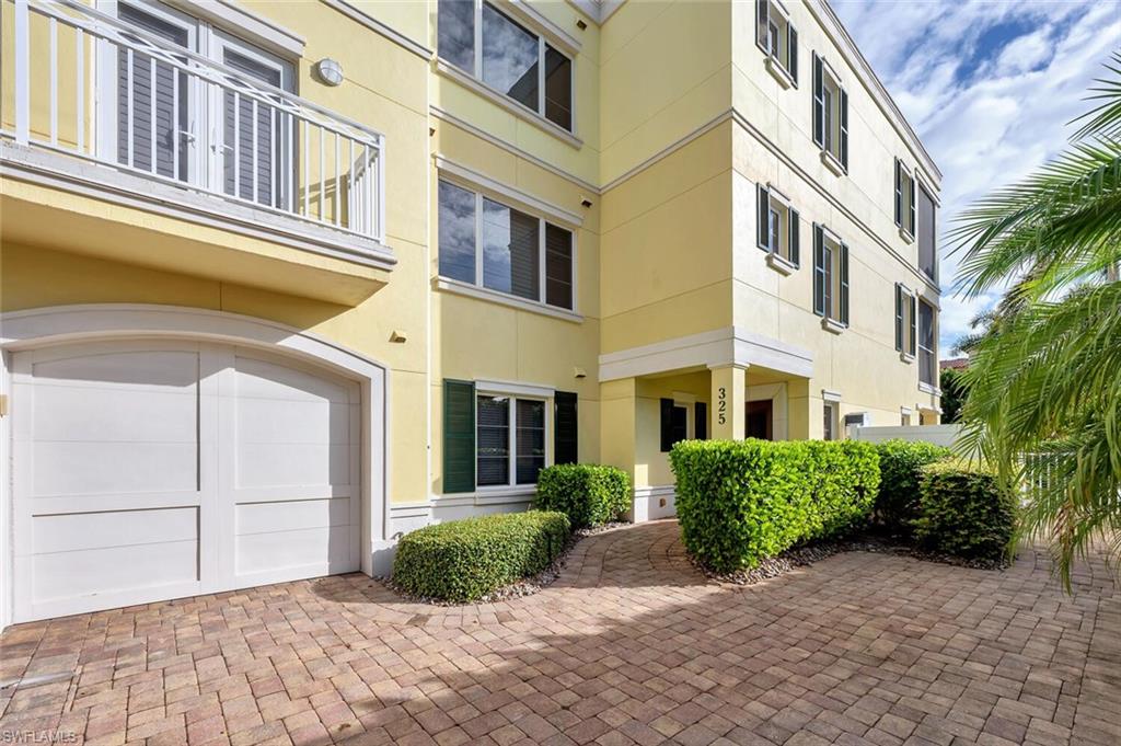 325 3rd Street South, Unit 6 Naples, FL 34102 - Photo 2 of 36 a front view of a multi story residential apartment building