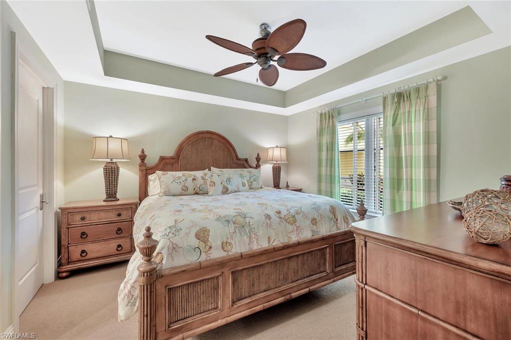 325 3rd Street South, Unit 6 Naples, FL 34102 - Photo 24 of 36 a bedroom with a bed and window