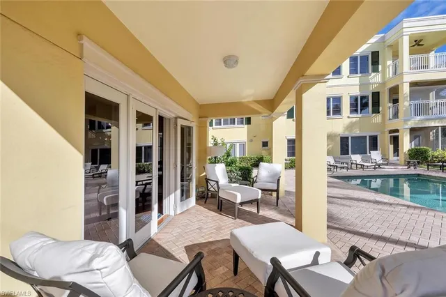 a view of a swimming pool with a patio