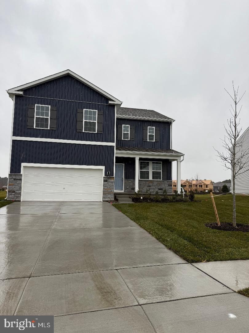 212 Daytona Road Egg Harbor Township, NJ 08234 - Photo 1 of 14 a front view of a house with a yard