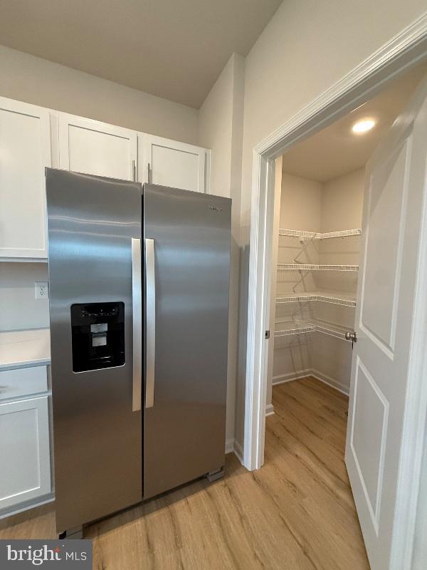 212 Daytona Road Egg Harbor Township, NJ 08234 - Photo 5 of 14 a kitchen with a refrigerator and a sink