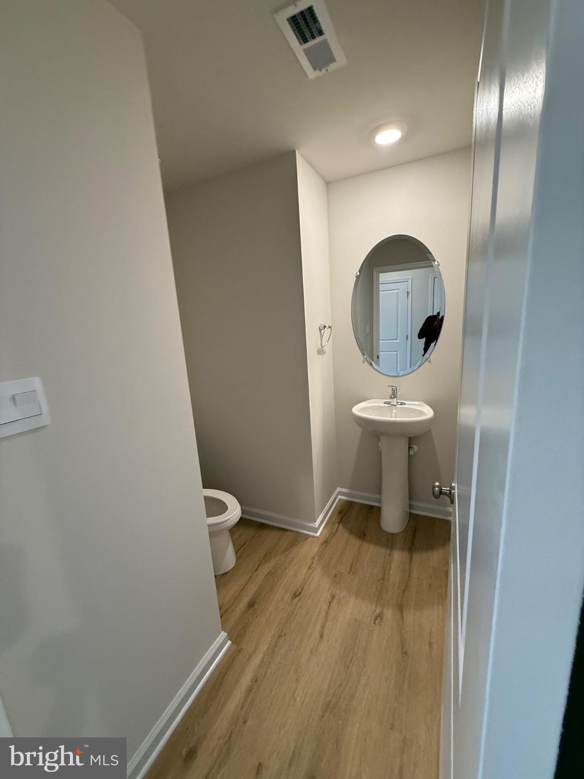 212 Daytona Road Egg Harbor Township, NJ 08234 - Photo 6 of 14 a bathroom with a toilet and a sink