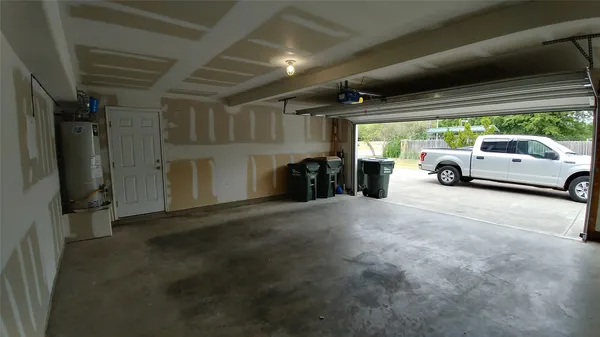 a view of parking garage with furniture