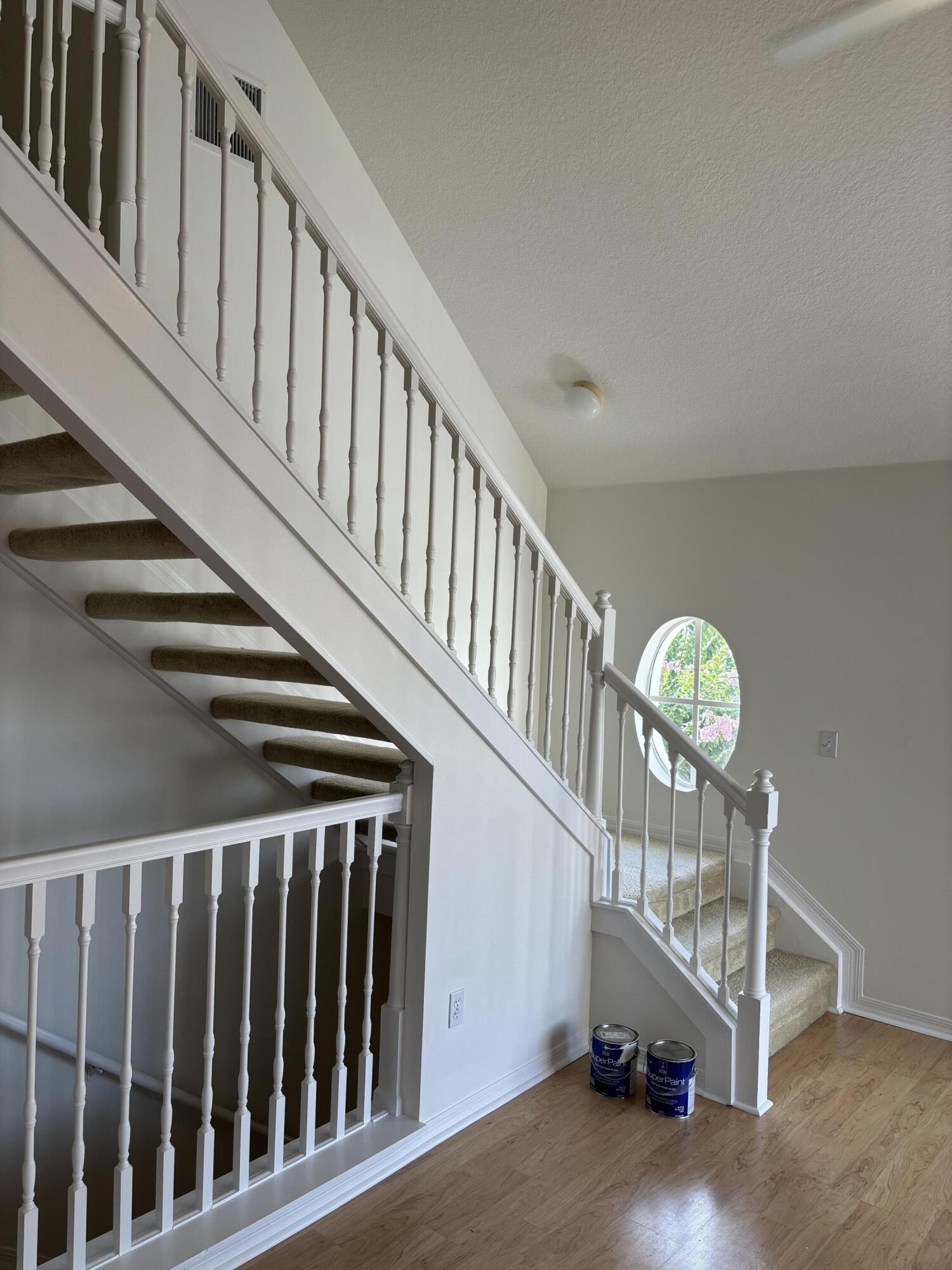 1621 Southeast Pomeroy Street, Unit 56 Stuart, FL 34997 - Photo 8 of 8 view of stairway from living room