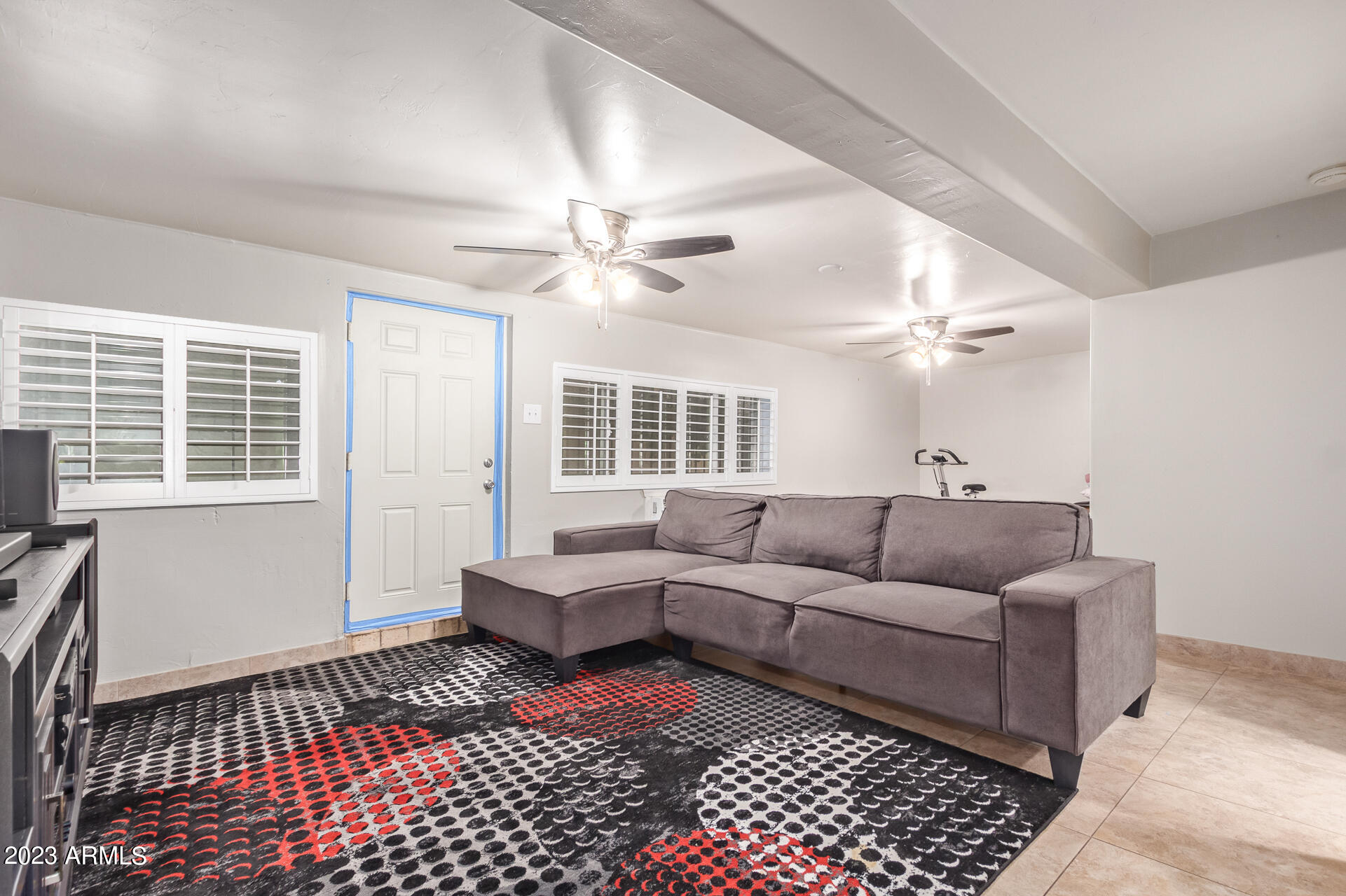 3834 North 34th Street Phoenix, AZ 85018 - Photo 17 of 29 a living room with furniture and a window