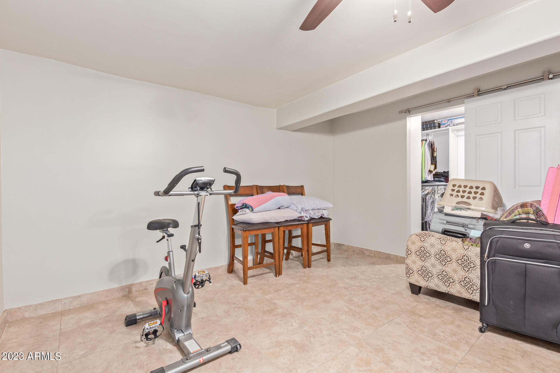 3834 North 34th Street Phoenix, AZ 85018 - Photo 19 of 29 a living room with furniture and a table