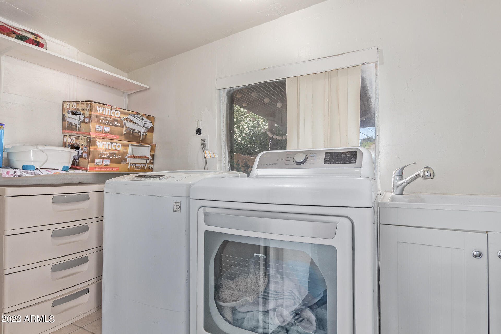 3834 North 34th Street Phoenix, AZ 85018 - Photo 24 of 29 a utility room with dryer and washer