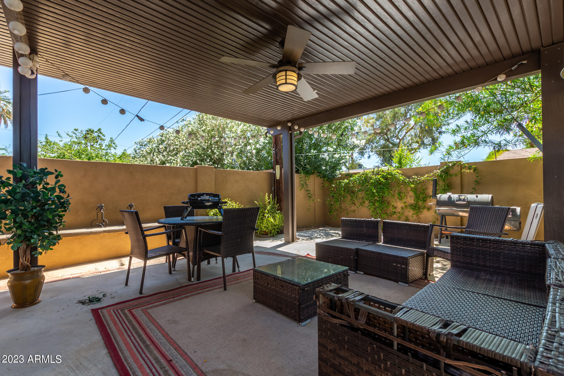 3834 North 34th Street Phoenix, AZ 85018 - Photo 29 of 29 a outdoor living space with furniture and garden view