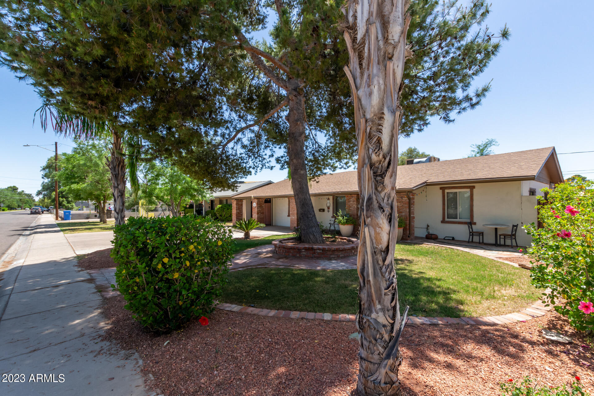 3834 North 34th Street Phoenix, AZ 85018 - Photo 3 of 29 a front view of a house with garden