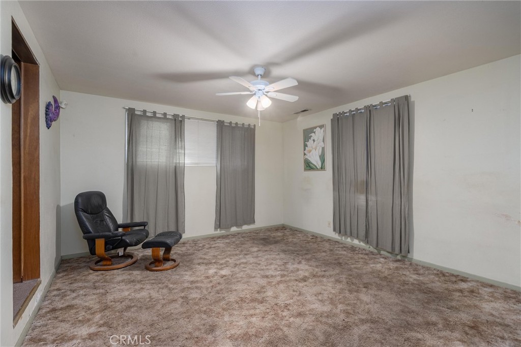 559 East Chico, CA 95926 - Photo 11 of 32 a view of a workspace with furniture and a ceiling fan