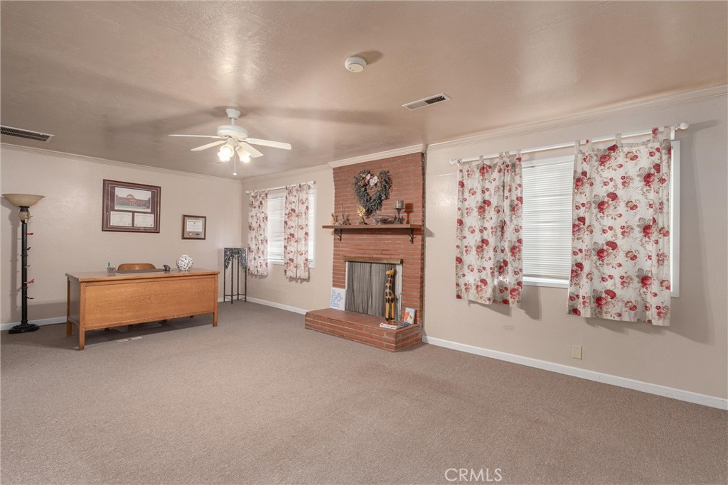 559 East Chico, CA 95926 - Photo 6 of 32 a spacious bedroom with a bed and a couch