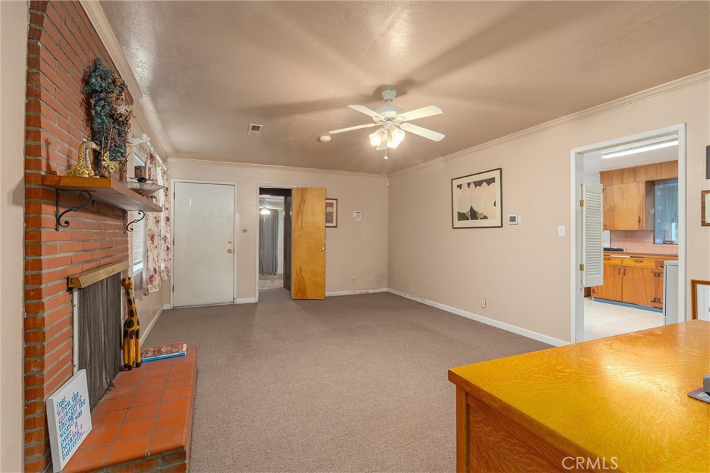 559 East Chico, CA 95926 - Photo 7 of 32 wooden floor in an empty room with a fireplace