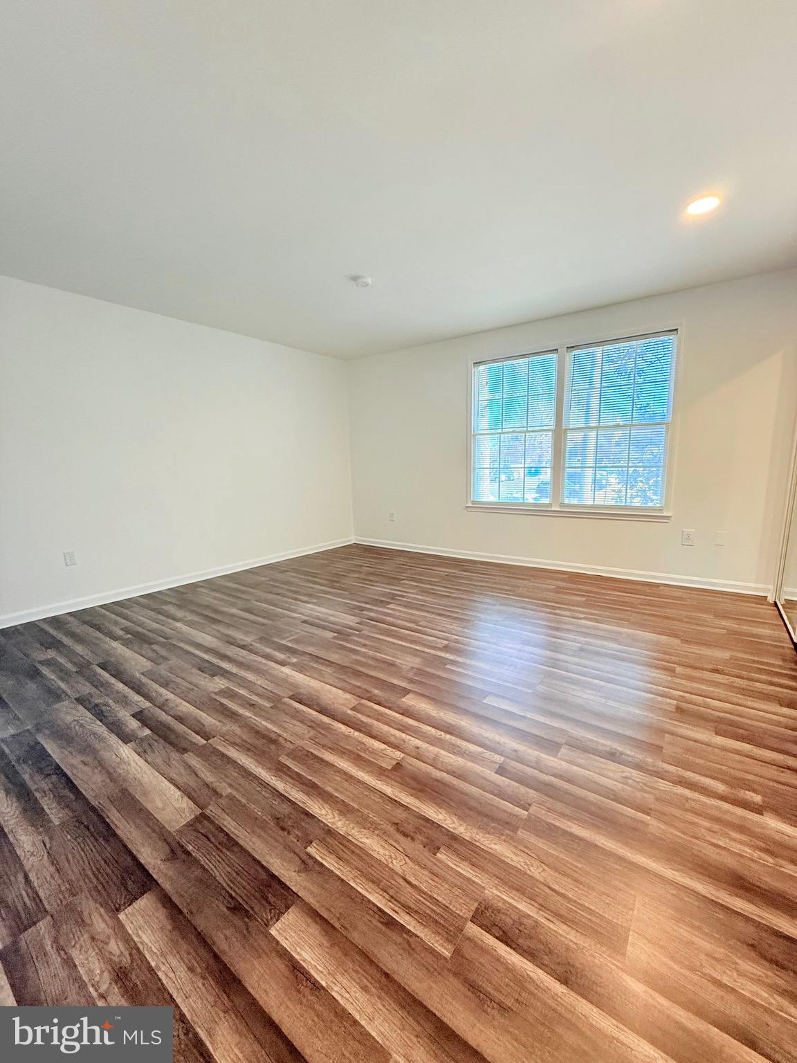 730 Quince Orchard Boulevard, Unit 730101 Gaithersburg, MD 20878 - Photo 20 of 47 wooden floor in a room