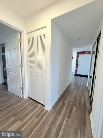 a view of a livingroom with wooden floor