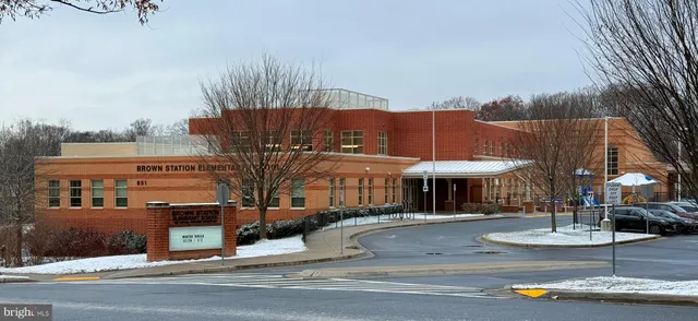 a view of a building with a garden