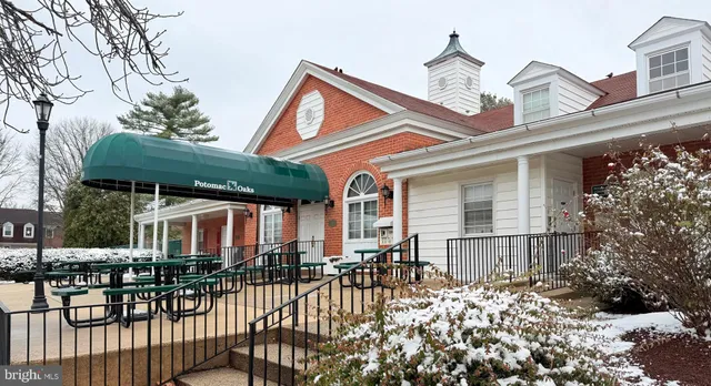 a front view of a house with a porch