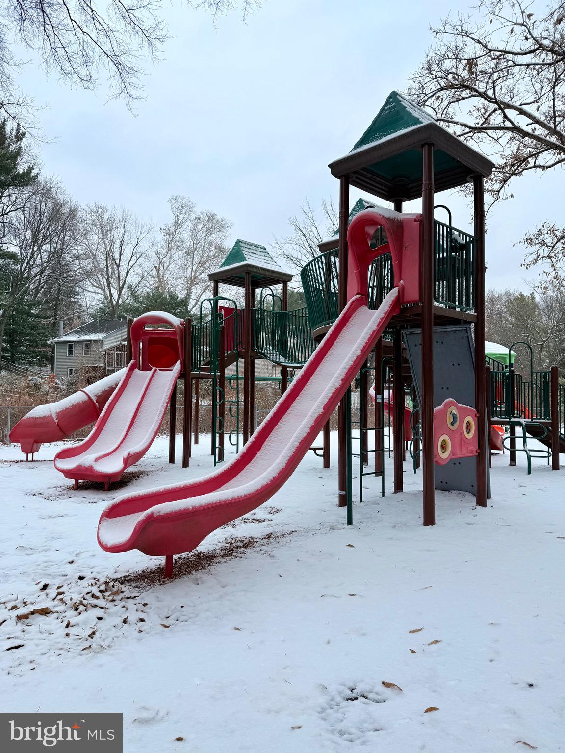 730 Quince Orchard Boulevard, Unit 730101 Gaithersburg, MD 20878 - Photo 35 of 47 a backyard of a house with barbeque oven table and chairs