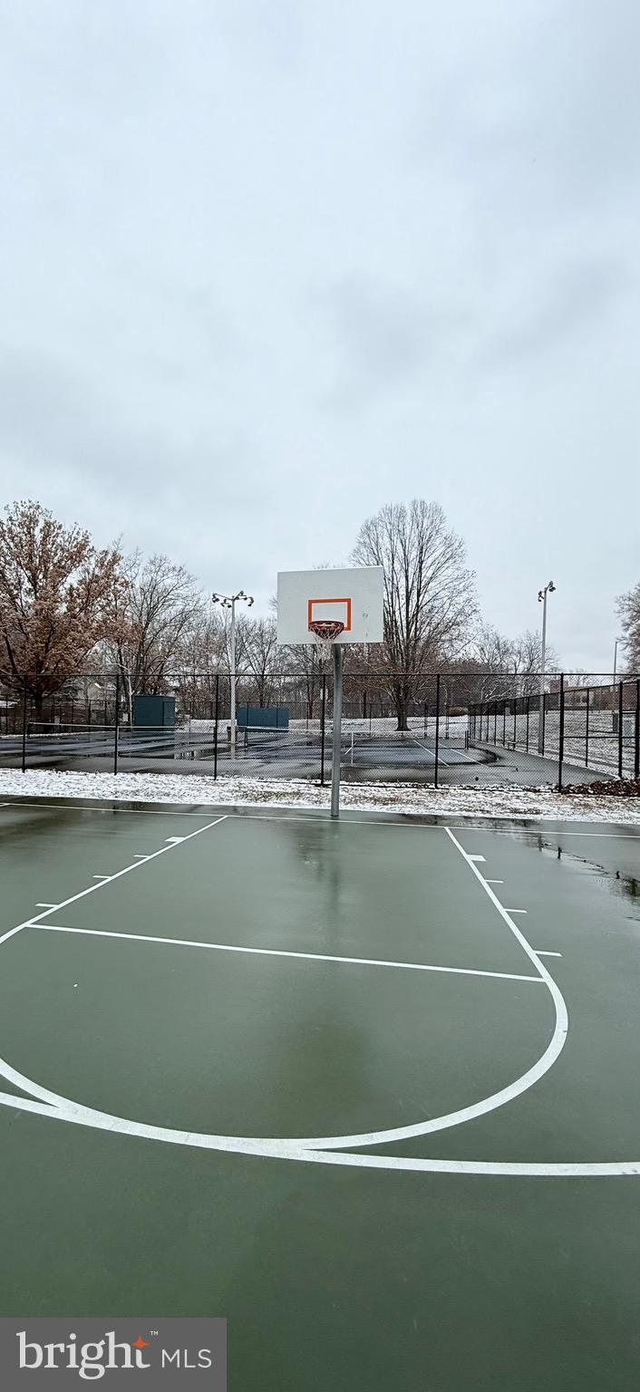 730 Quince Orchard Boulevard, Unit 730101 Gaithersburg, MD 20878 - Photo 39 of 47 a view of a tennis court