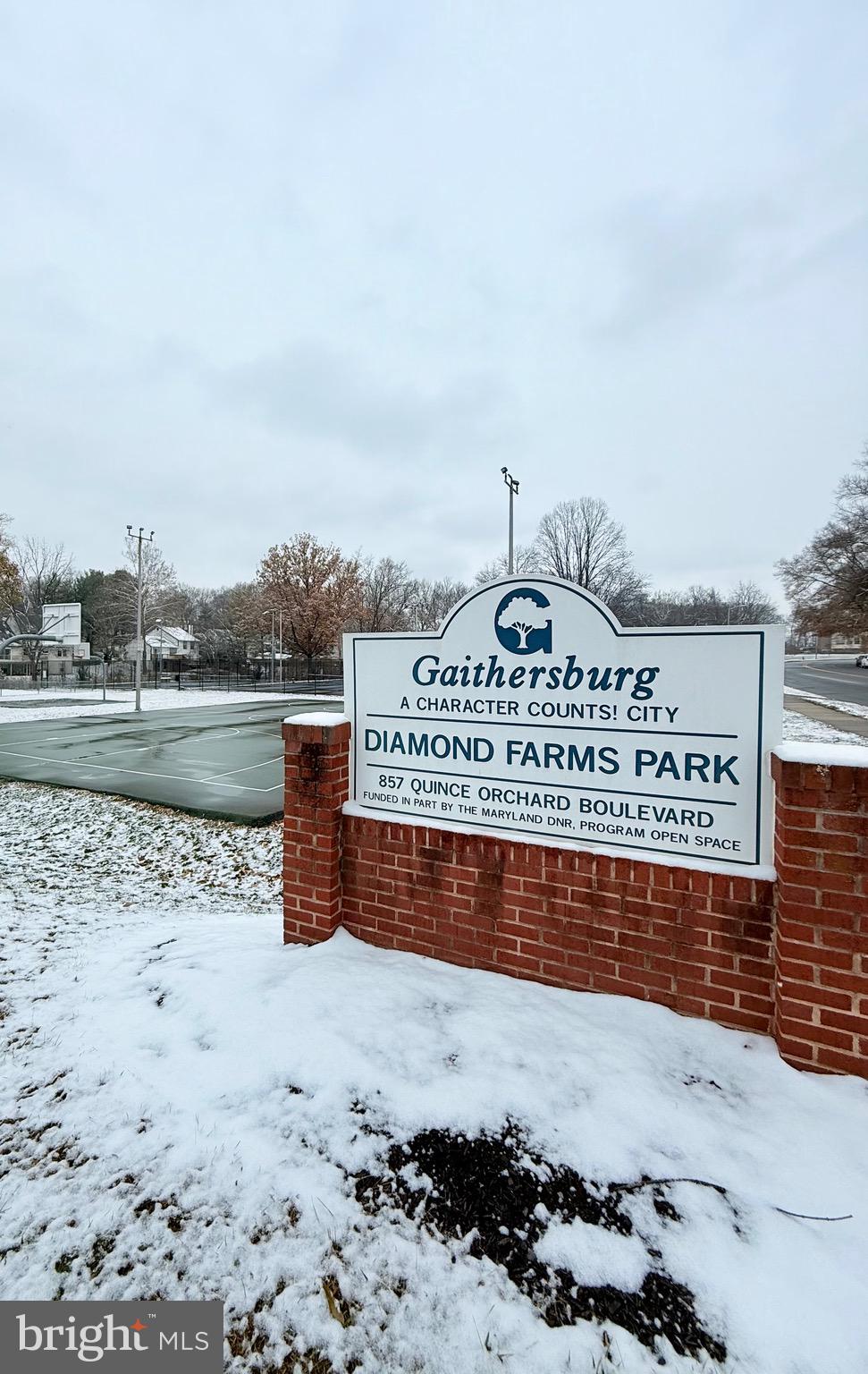 730 Quince Orchard Boulevard, Unit 730101 Gaithersburg, MD 20878 - Photo 40 of 47 a view of a dry yard with wooden fence