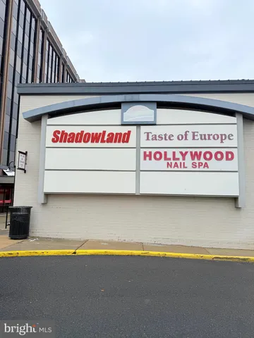 a car parked in front of a store