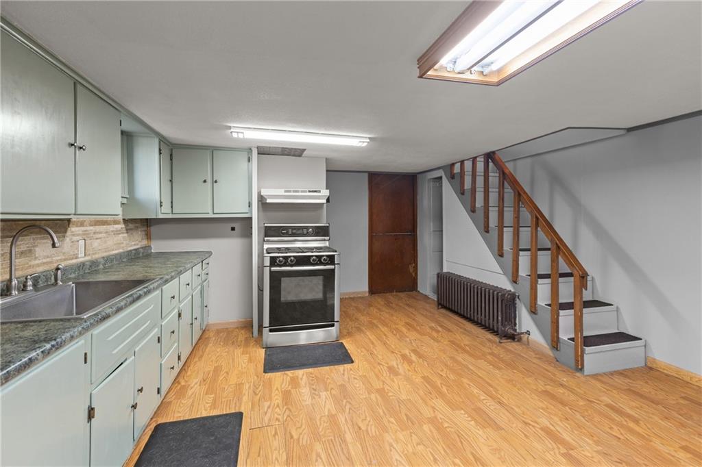 62 Allegheny Avenue Valencia, PA 16059 - Photo 13 of 30 a kitchen with granite countertop a sink and appliances