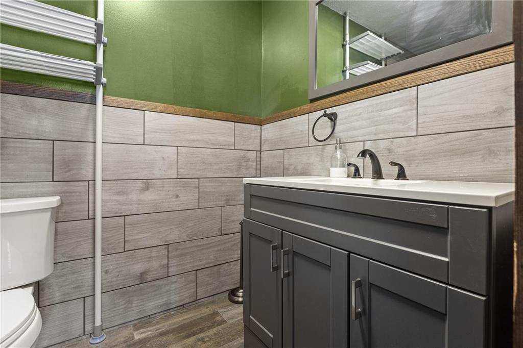 62 Allegheny Avenue Valencia, PA 16059 - Photo 20 of 30 a close view of a sink and a mirror