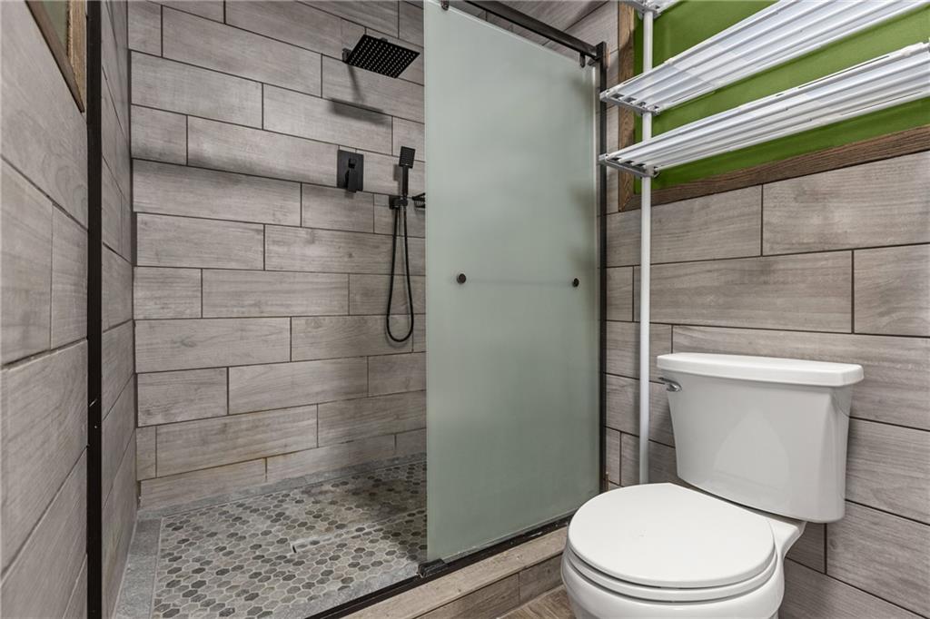 62 Allegheny Avenue Valencia, PA 16059 - Photo 21 of 30 a white toilet sitting next to a bathroom