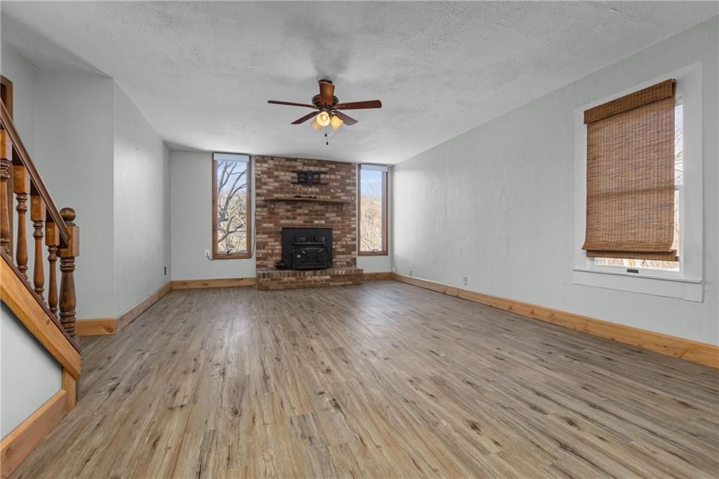 62 Allegheny Avenue Valencia, PA 16059 - Photo 8 of 30 wooden floor in an empty room with a window