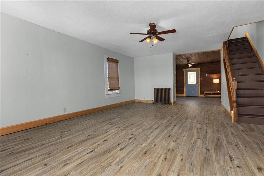 62 Allegheny Avenue Valencia, PA 16059 - Photo 9 of 30 a view of empty room with wooden floor and fan