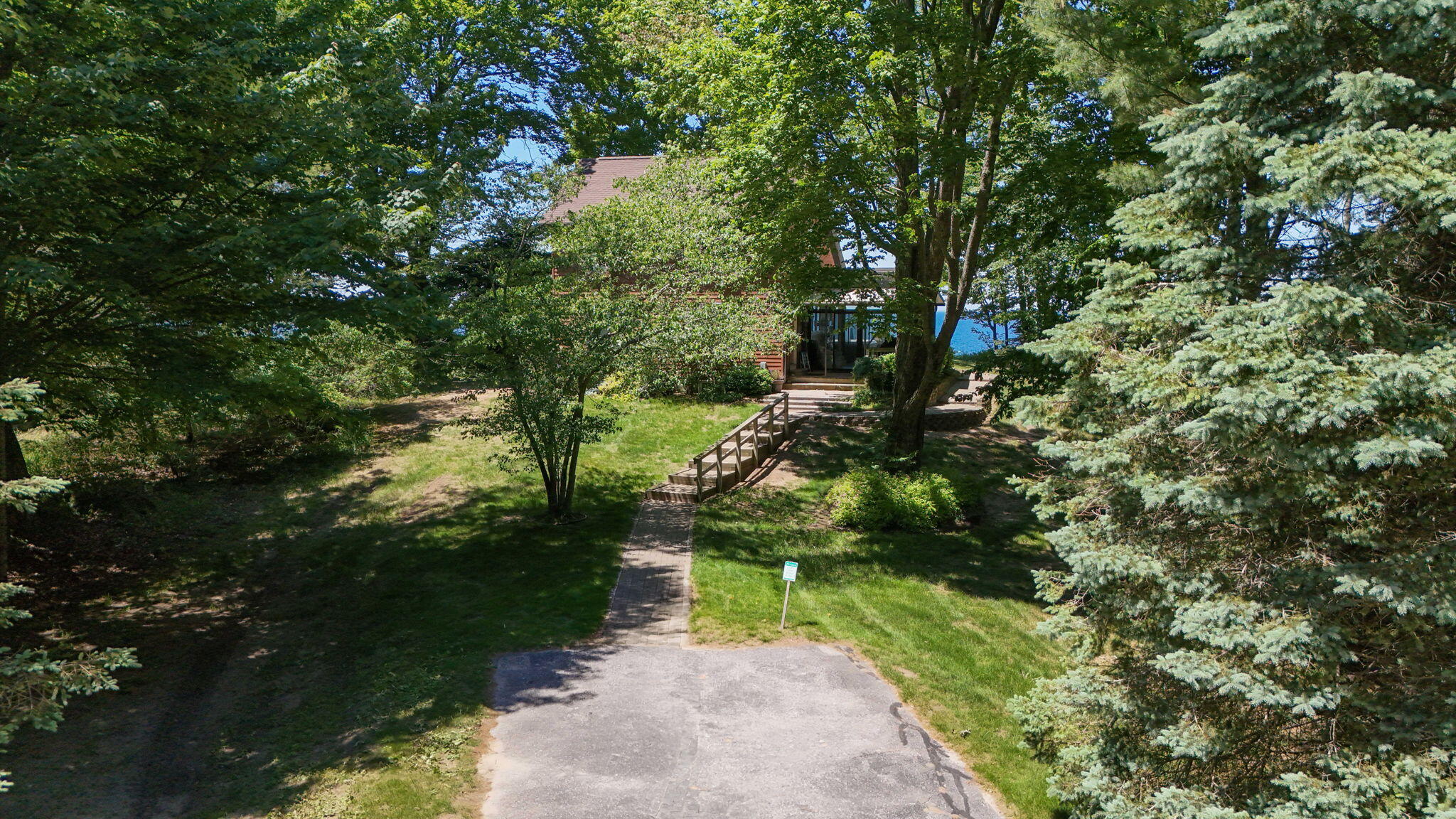 4616 West Fox Farm Road Manistee, MI 49660 - Photo 2 of 50 1-web-or-mls-DJI_20260627140658_0701_D
