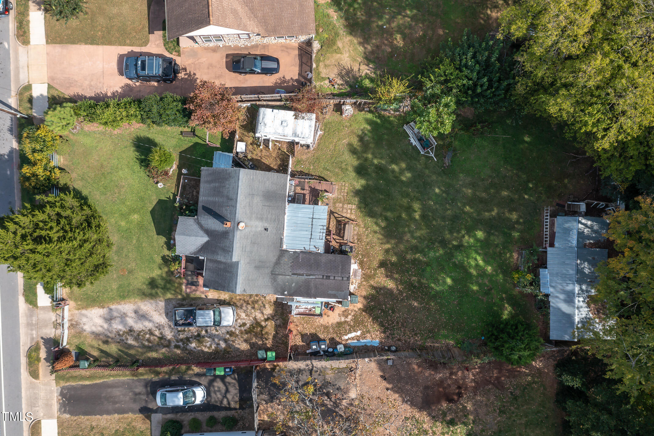 2214 Milburnie Road Raleigh, NC 27610 - Photo 5 of 14 an aerial view of a house with a yard