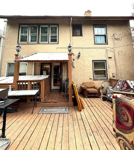 a terrace of a house with outdoor seating