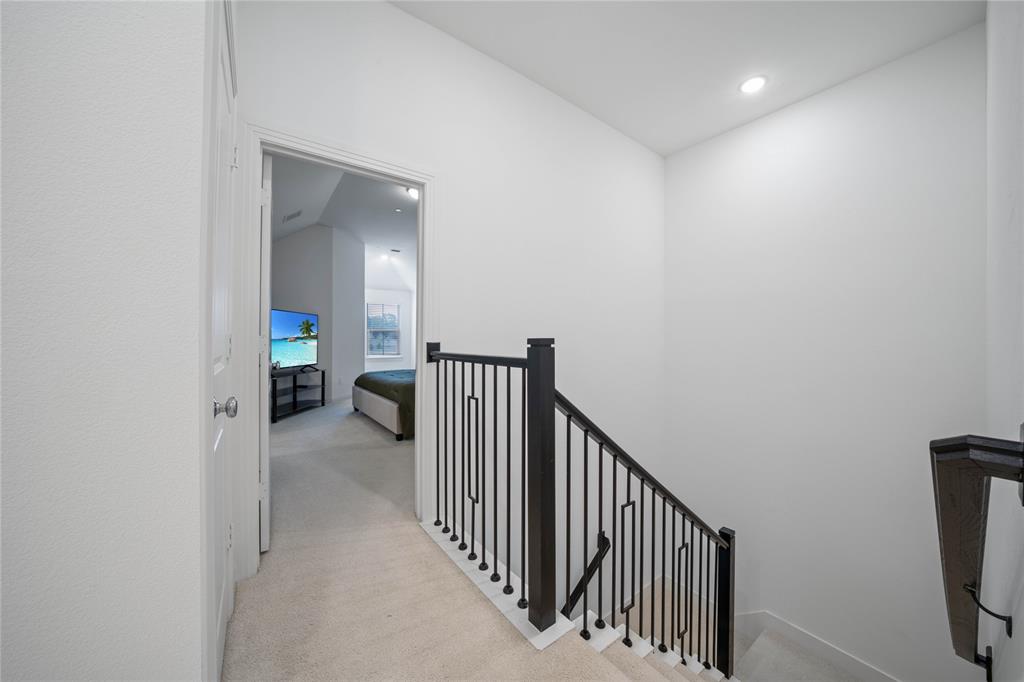 313 Sugar Maple Lane McKinney, TX 75071 - Photo 20 of 40 a view of a hallway with a livingroom and a window