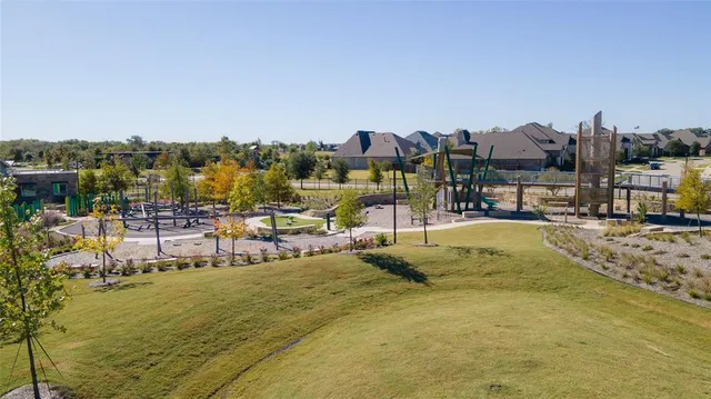 a view of a lake with couches and city view