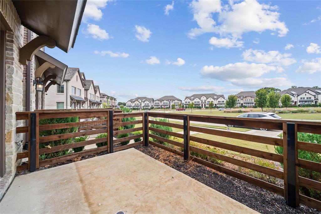 313 Sugar Maple Lane McKinney, TX 75071 - Photo 4 of 40 a view of a balcony with city view