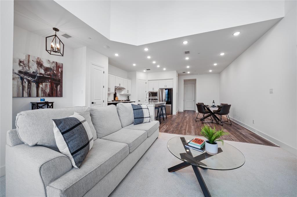 313 Sugar Maple Lane McKinney, TX 75071 - Photo 5 of 40 a living room with furniture kitchen view and a table