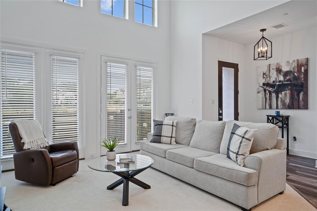 313 Sugar Maple Lane McKinney, TX 75071 - Photo 8 of 40 a living room with furniture and windows