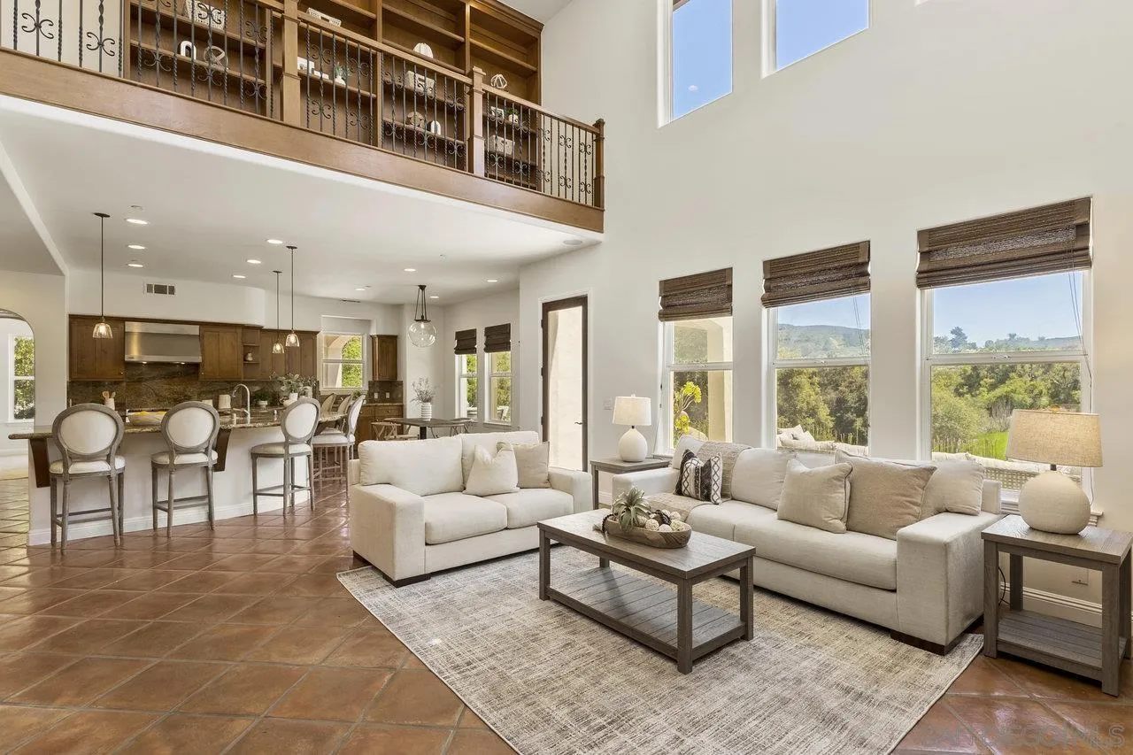 20919 Questhaven Road San Marcos, CA 92078 - Photo 20 of 54 a living room with furniture and a large window