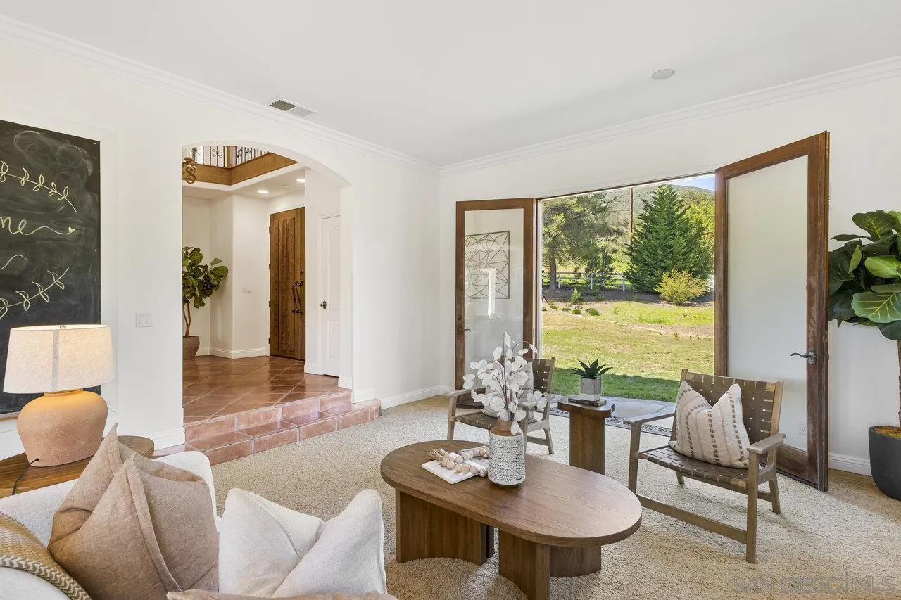 20919 Questhaven Road San Marcos, CA 92078 - Photo 2 of 54 a living room with furniture and a large window