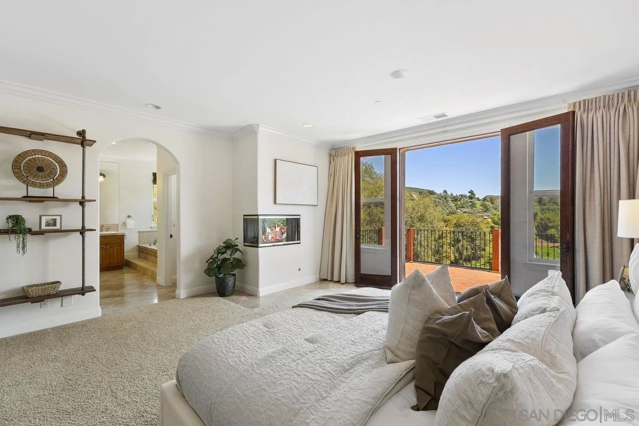 20919 Questhaven Road San Marcos, CA 92078 - Photo 25 of 54 a living room with furniture and a large window